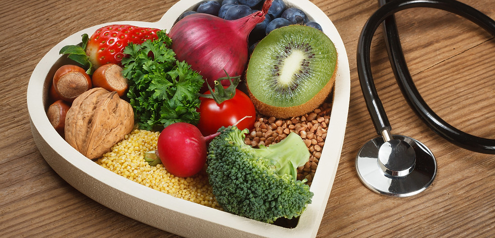 Healthy food in heart shaped bowl and st
